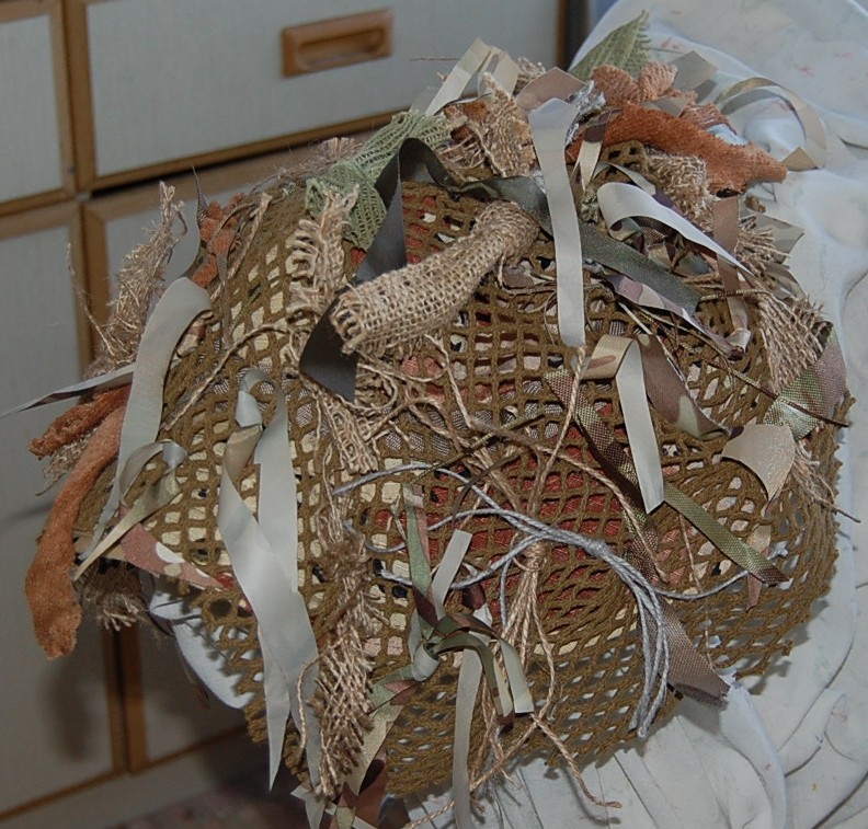 Properly camouflaged boonie hat.