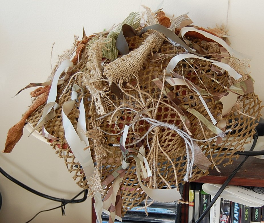 Boonie hat with camouflaged cover