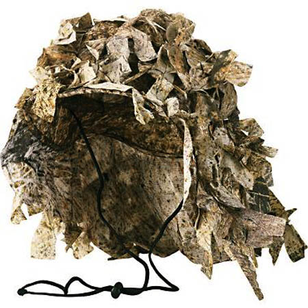 Camouflage cover over boonie hat.